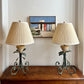 Pair of wrought iron and travertine table lamps