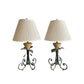 Pair of wrought iron and travertine table lamps