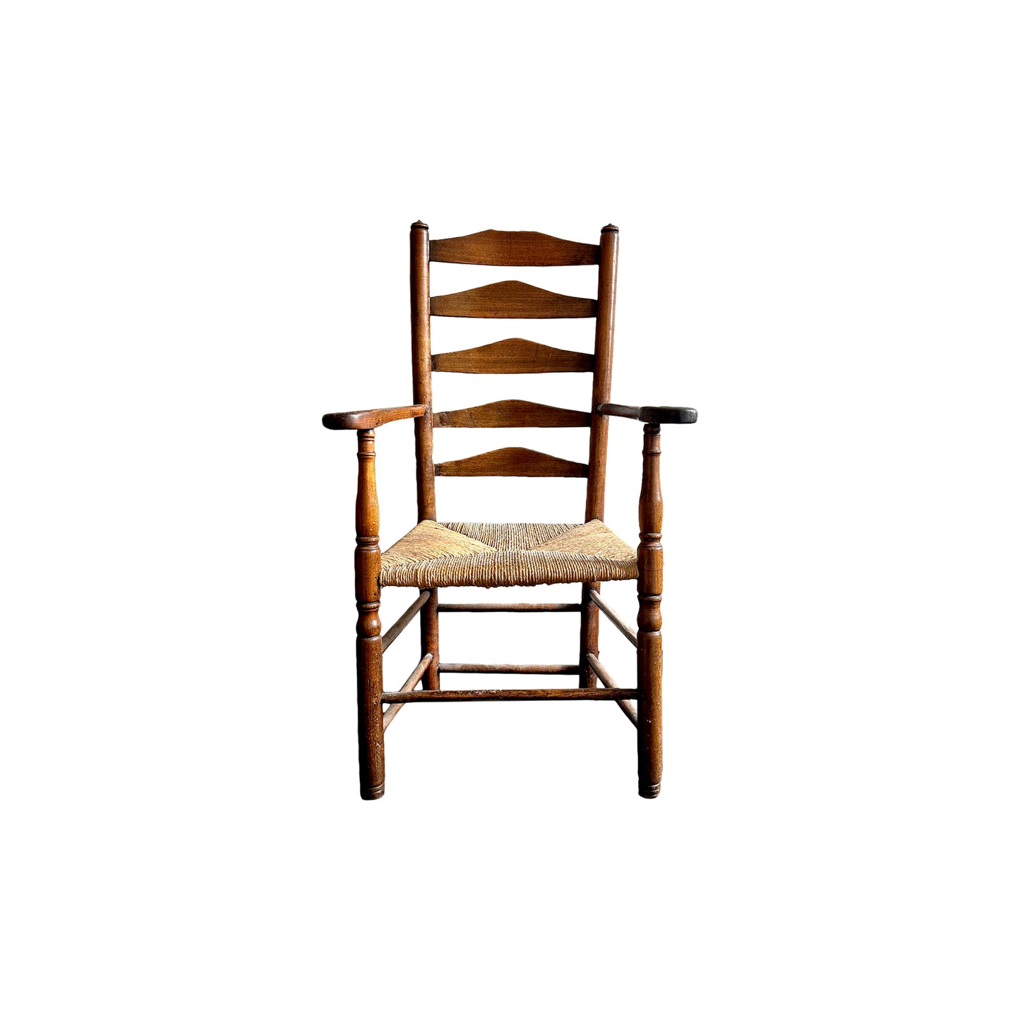 Ladder back chair with a rush seat